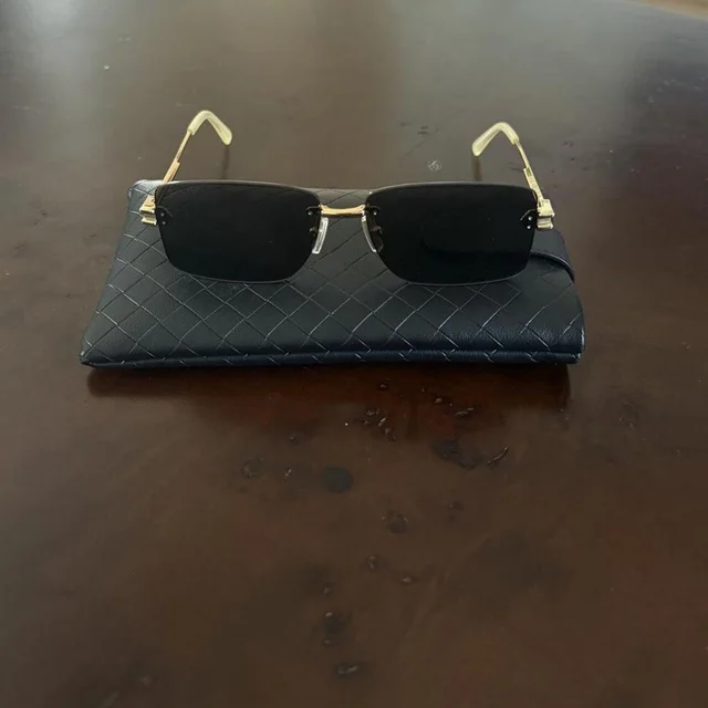 Bottega Veneta Women's Sunglasses - Black in black from Depop, photo 1 of 1