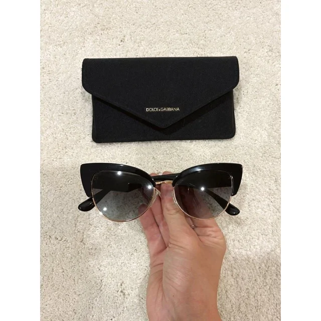Dolce & Gabbana Women's Sunglasses - Black/Gold in gold|black from Depop, photo 1 of 1