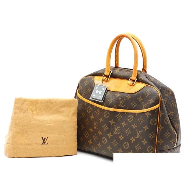 Louis Vuitton Handbag Monogram Canvas in Coated canvas from The Reluxe