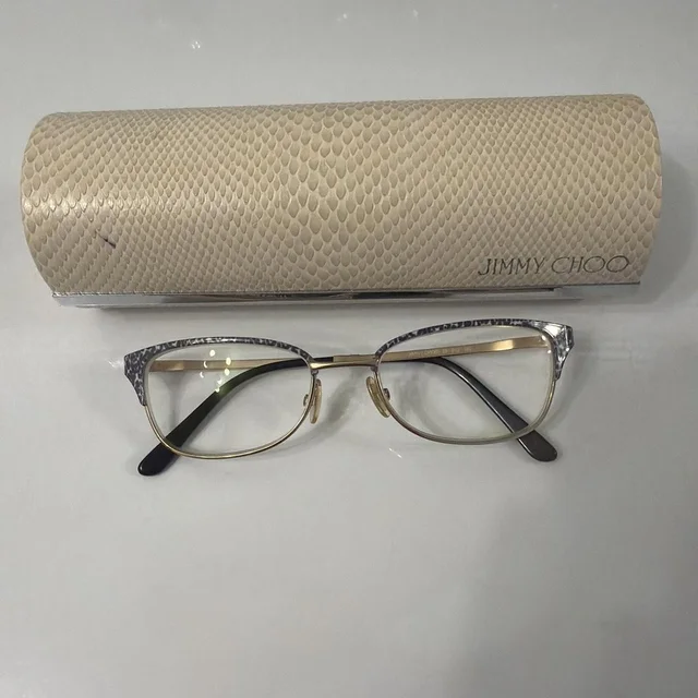 Jimmy Choo Women's Sunglasses - Gold/Black in black|gold from Depop, photo 1 of 1