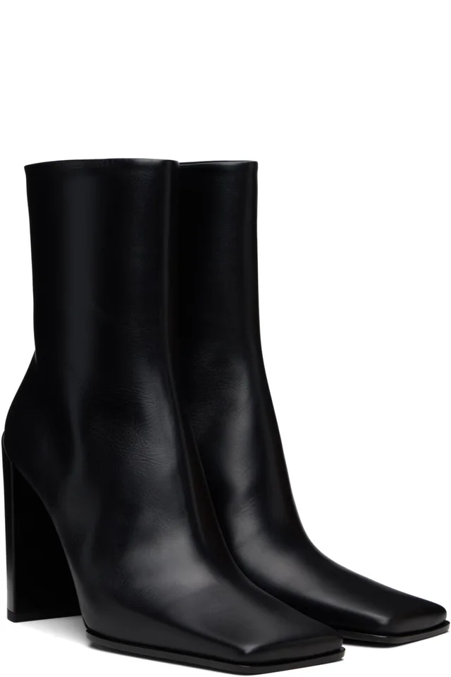 ALAÏA Black Soft Calf 90 Ankle Boots, photo 4 of 4 from SSENSE