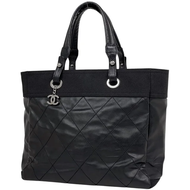 Chanel Tote Bag Paris Biarritz MM CC Logo Black in Black Coated canvas from The Reluxe