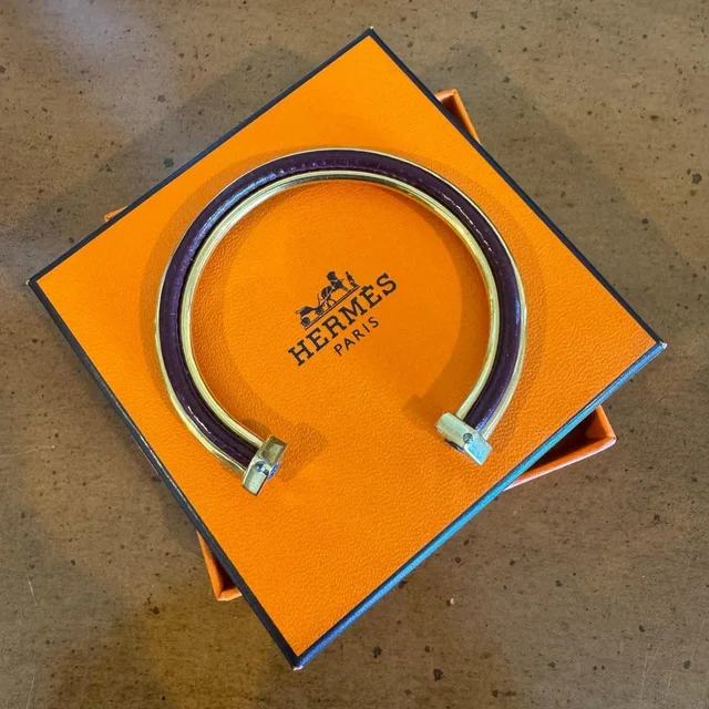Hermès Women's Bracelet - Gold/Red in gold|red from Depop, photo 1 of 1