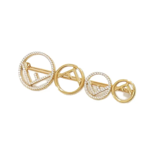 F IS FENDI Brooch in CLEAR / GOLD metal fittings 横x縦: 6.2cmx2cm from KOMEHYO