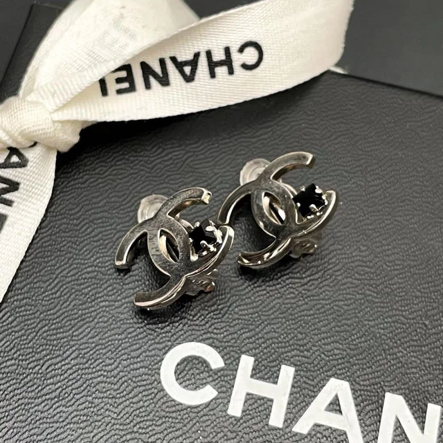 Chanel 05P CC Logo Earrings Icon Silver Black Coco in Black from The Reluxe