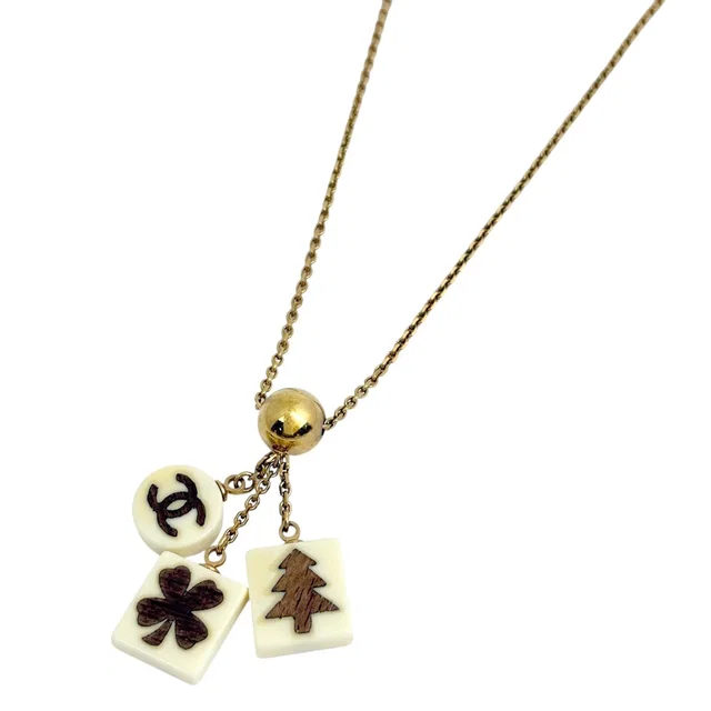 Chanel CC Logo Necklace Clover Tree Gold Plated White in White from The Reluxe