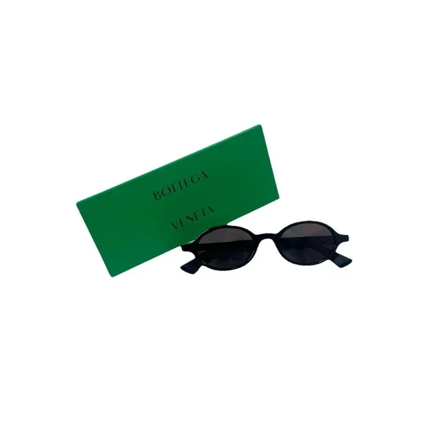 Bottega Veneta Women's Sunglasses - Black in black from Depop, photo 1 of 1