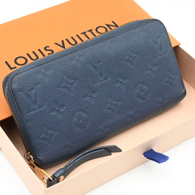 Louis Vuitton Zippy Wallet Empreinte Blue in Blue Leather from The Reluxe