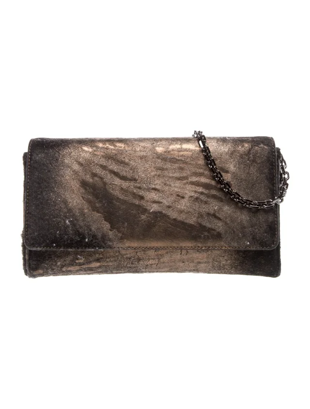 Judith Leiber Clutch clutches in brown|red Suede from The RealReal