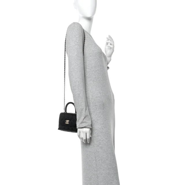 Chanel Caviar Quilted Coco Handle Clutch in Black Caviar leather from FASHIONPHILE, photo 2 of 11