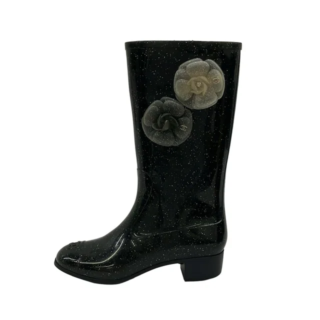 Chanel Rain Boots Black Camellia in Black from The Reluxe
