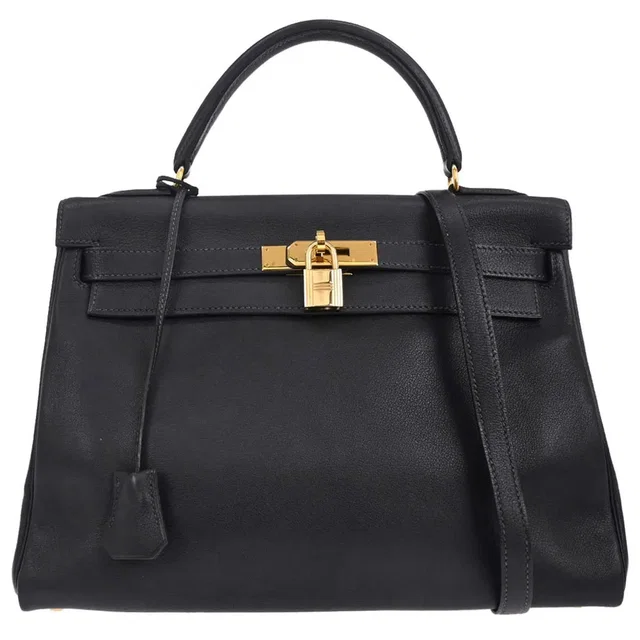 Hermès Kelly Blue Courchevel in Blue Leather from HEWI