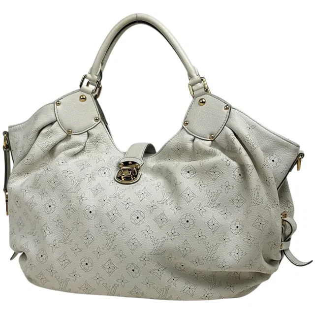 Louis Vuitton Mahina L Handbag Perforated Monogram Blanc in White from The Reluxe