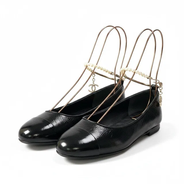 Chanel Ballerina Pearl Anklet CC Logo Flat Pumps Black in Black from The Reluxe