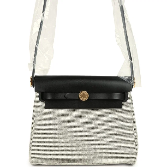 Hermès Herbag Zip 20 Mini Ecru and Black Toile H Canvas and Black Vache Hunter Gold Hardware in Black Canvas from Madison Avenue Couture