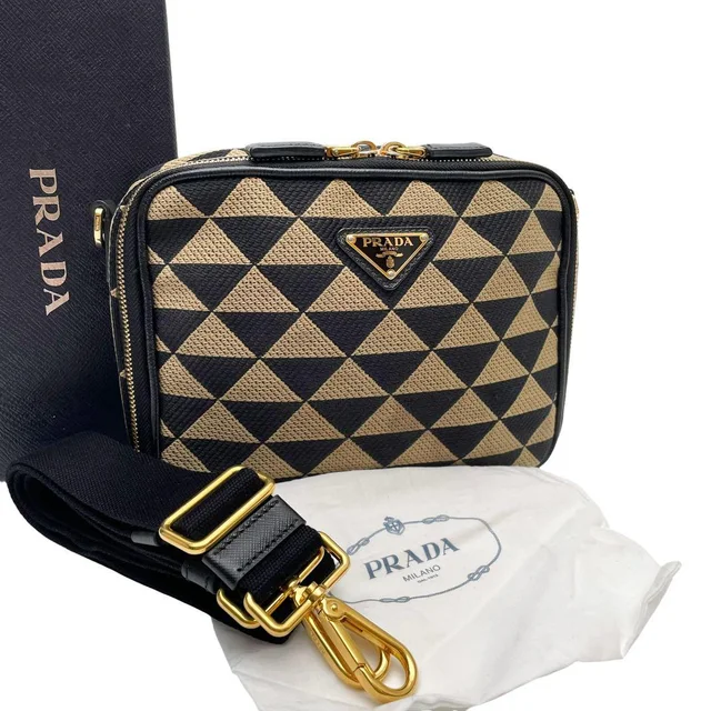 Prada Symbol Canvas Saffiano Brick Shoulder Bag in Saffiano leather from The Reluxe