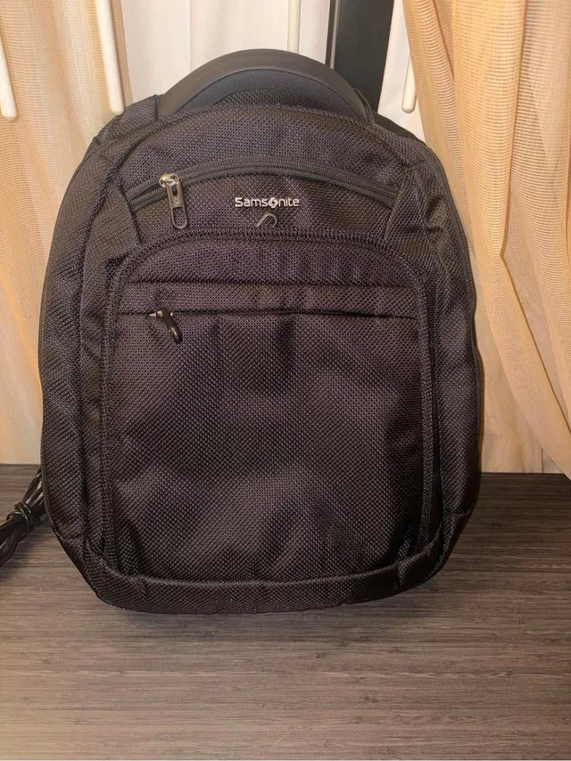 Samsonite Travel & Laptop Backpack in black from Poshmark