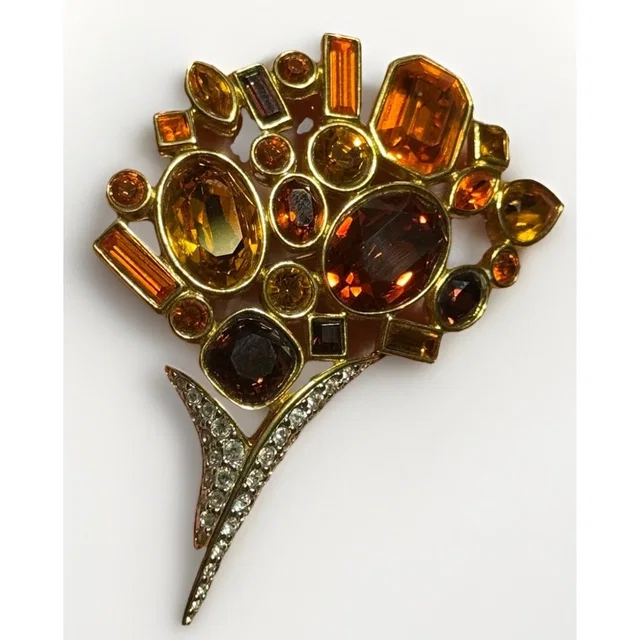 Swarovski Vintage Crystal Autumn Fall Bouquet Brooch Pin 22 Kt Gold Plating Rare in gold from Poshmark