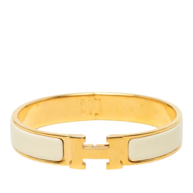 Gold Hermès Narrow Enamel Clic H Bracelet PM in Gold from Designer Revival