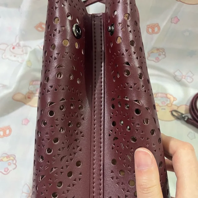 Alaïa Alaa Laser-Cut Tote Bag In Wine in red from Poshmark, photo 6 of 15