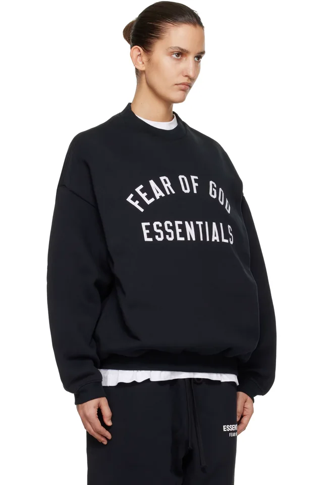 Fear of God ESSENTIALS Black Varsity Crewneck Sweatshirt, photo 2 of 4 from SSENSE