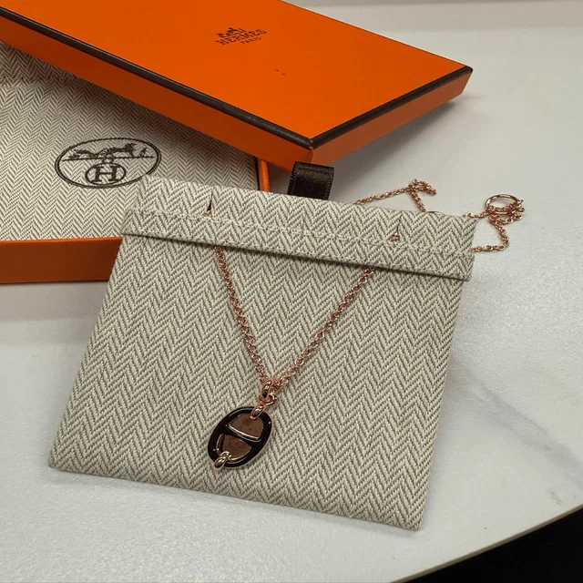 Hermès Mini Maillon pendant in Leather from Luxury Promise