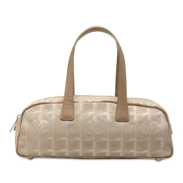 Beige Chanel New Travel Line Nylon Handbag in Beige Nylon from Designer Revival, photo 1 of 1