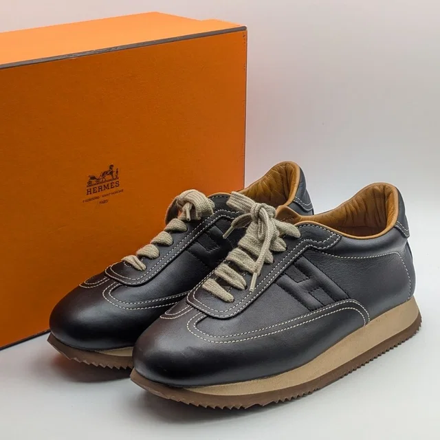 Hermès Quick Sneakers Leather Black Shoes in Black Leather from The Reluxe