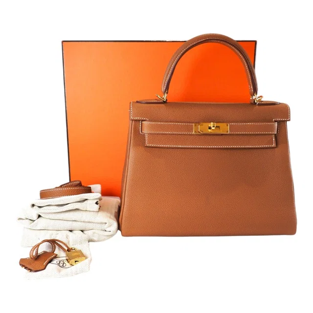 Hermès Kelly 28cm Gold with GHW Togo Retourne - Full Set - Unused in Gold Togo leather from Luxury Promise
