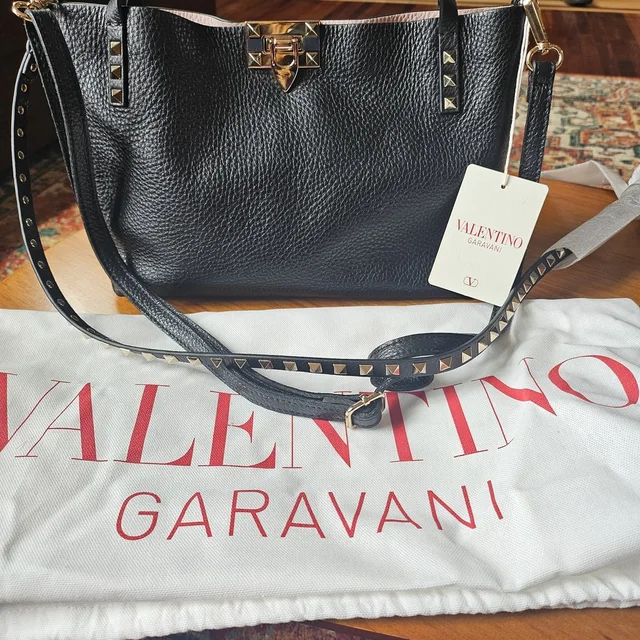 Valentino Garavani Black Rockstud Leather Shoulder Bag in black|gold Leather from Poshmark, photo 1 of 1