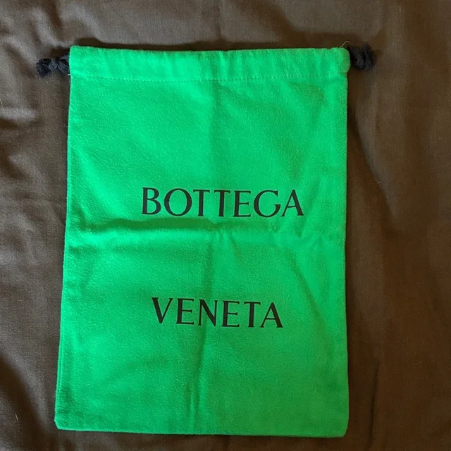 Bottega Veneta Neon Green Drawstring Pouch With Black Logo in green|black from Poshmark