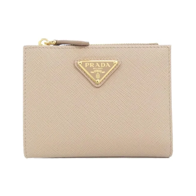 Prada Wallet Gold in Gold Saffiano leather from The Reluxe