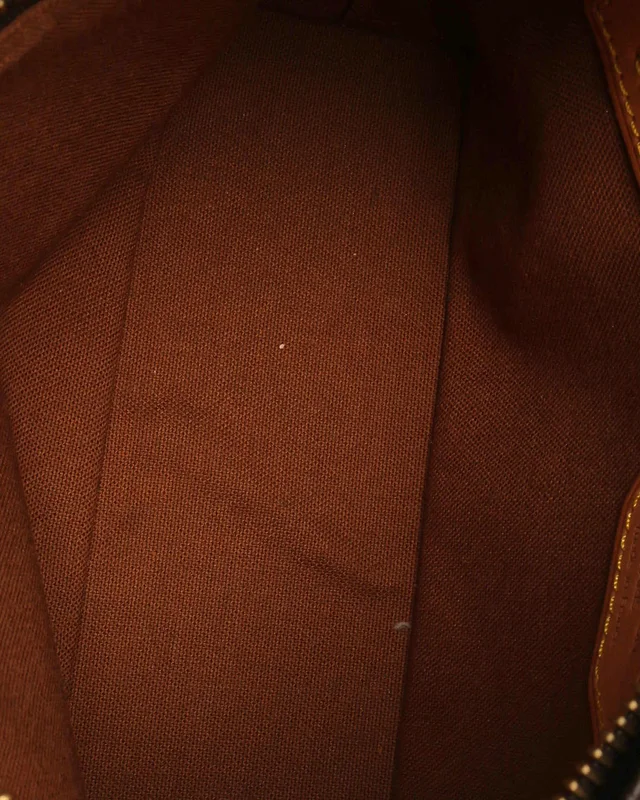 Louis Vuitton Monogram Trotteur Bag in Coated canvas from A Retro Tale, photo 8 of 9