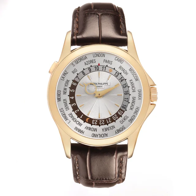 Patek Philippe Complications (Reference 5130J). A 39.5mm yellow gold automatic wristwatch with world time and… from Sotheby's
