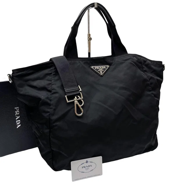 Prada Nylon Leather Hand Tote Shoulder Bag Triangle Plate Logo in Nylon from The Reluxe