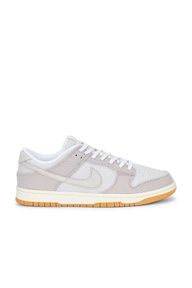 Nike Dunk Low Retro SE in White from REVOLVE (Canada), photo 1 of 1