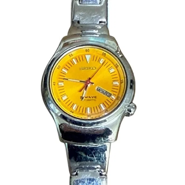 Seiko Vintage S Wave Silver Orange Face Automatic Women's Watch Working in silver|orange|gray from Poshmark