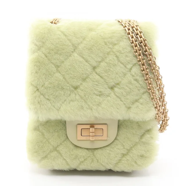Chanel Shoulder Bag 2.55 Quilted Mademoiselle Chain Apple Green Lambskin Mini in Green Lambskin from The Reluxe