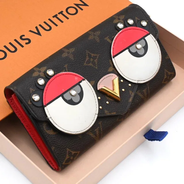 Louis Vuitton Monogram Lovely Bird Portefeuille Sarah Wallet in Coated canvas from The Reluxe