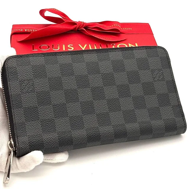 Louis Vuitton Wallet Damier Graphite Zippy Organizer Black in Black from The Reluxe