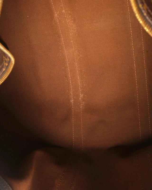 Louis Vuitton Monogram Keepall Bandoulière 55 Weekend Bag in Coated canvas from A Retro Tale, photo 9 of 11