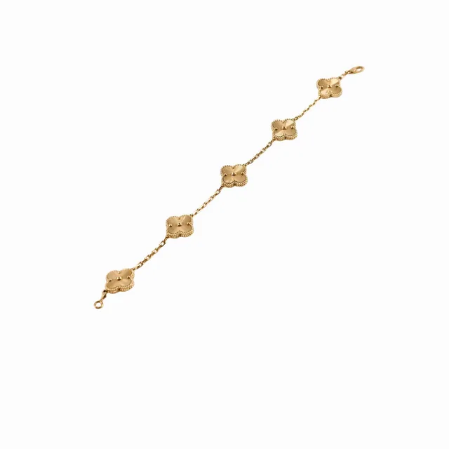 Van Cleef & Arpels Vintage Alhambra Yellow Gold Guilloche 5 Motifs Bracelet in Yellow from The Purse Affair