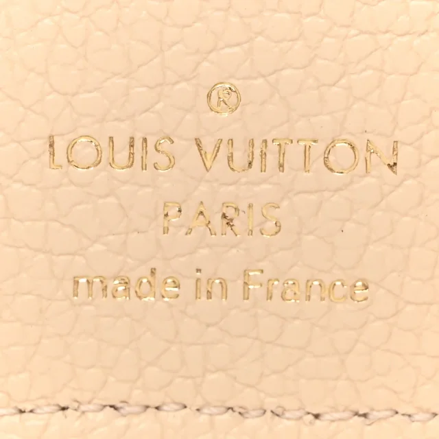 Louis Vuitton Empreinte Monogram Giant Victorine Wallet Creme Bois De Rose in Pink Calfskin from FASHIONPHILE, photo 6 of 8