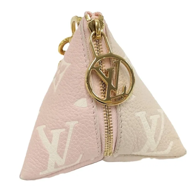 Louis Vuitton Berline Charm Pouch Monogram Empreinte Pink in Pink from The Reluxe