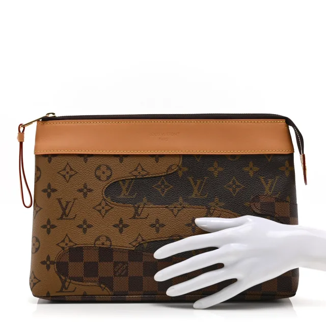 Louis Vuitton Reverse Monogram Drip Pochette Voyage Souple in Coated canvas from FASHIONPHILE, photo 2 of 8
