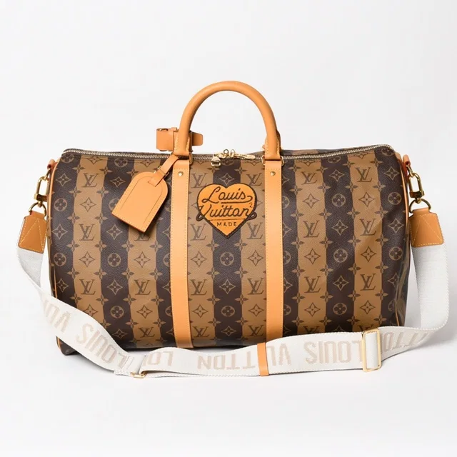 Louis Vuitton NIGO Boston Bag Keepall Bandouliere 50 in Coated canvas from The Reluxe