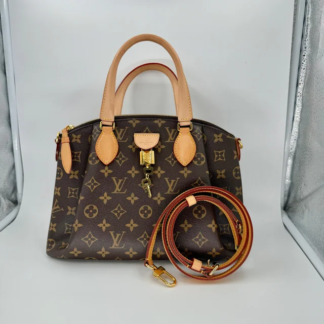 Louis Vuitton Monogram Rivoli PM bag in Coated canvas from SparklesnDreams