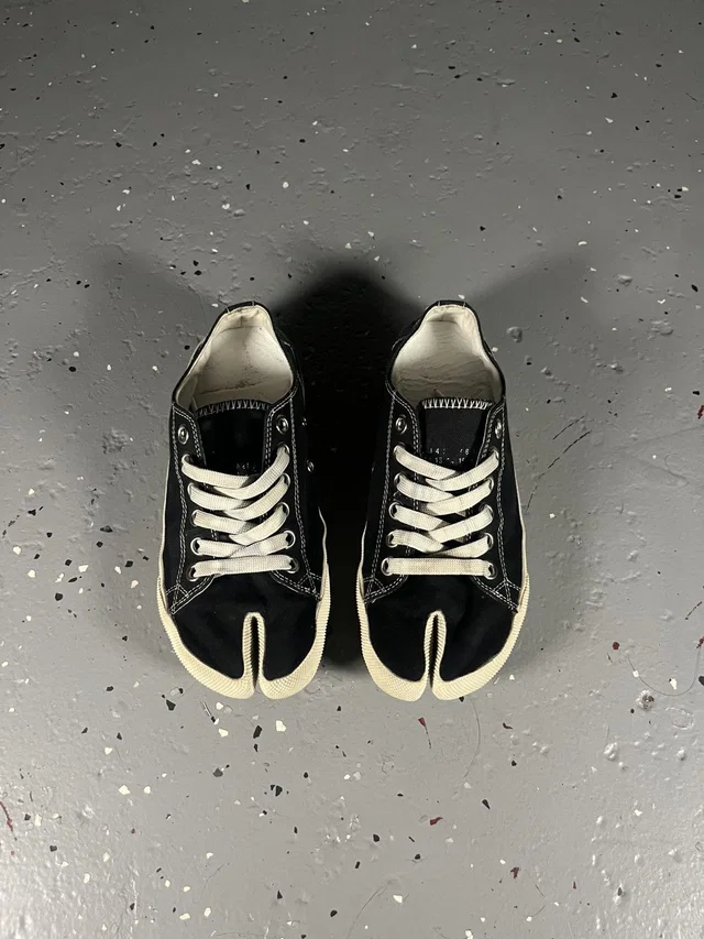 Maison Margiela Tabi Low Top Canvas Sneaker in black Canvas from Grailed