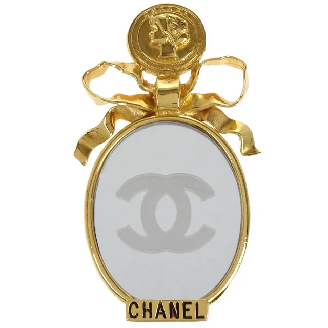 Chanel Bow Mirror Brooch Pin Gold in Gold from AMORE Vintage Tokyo
