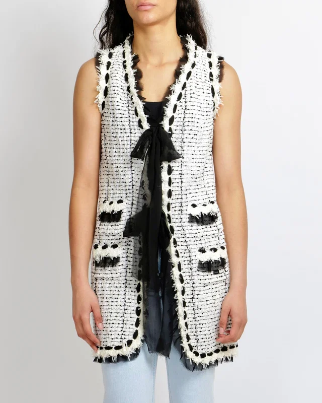 Chanel Spring 2005 White Sequin Tweed Sleeveless Gilet with Black Silk Front Tie Details Size FR 40… in Black Tweed from Sellier